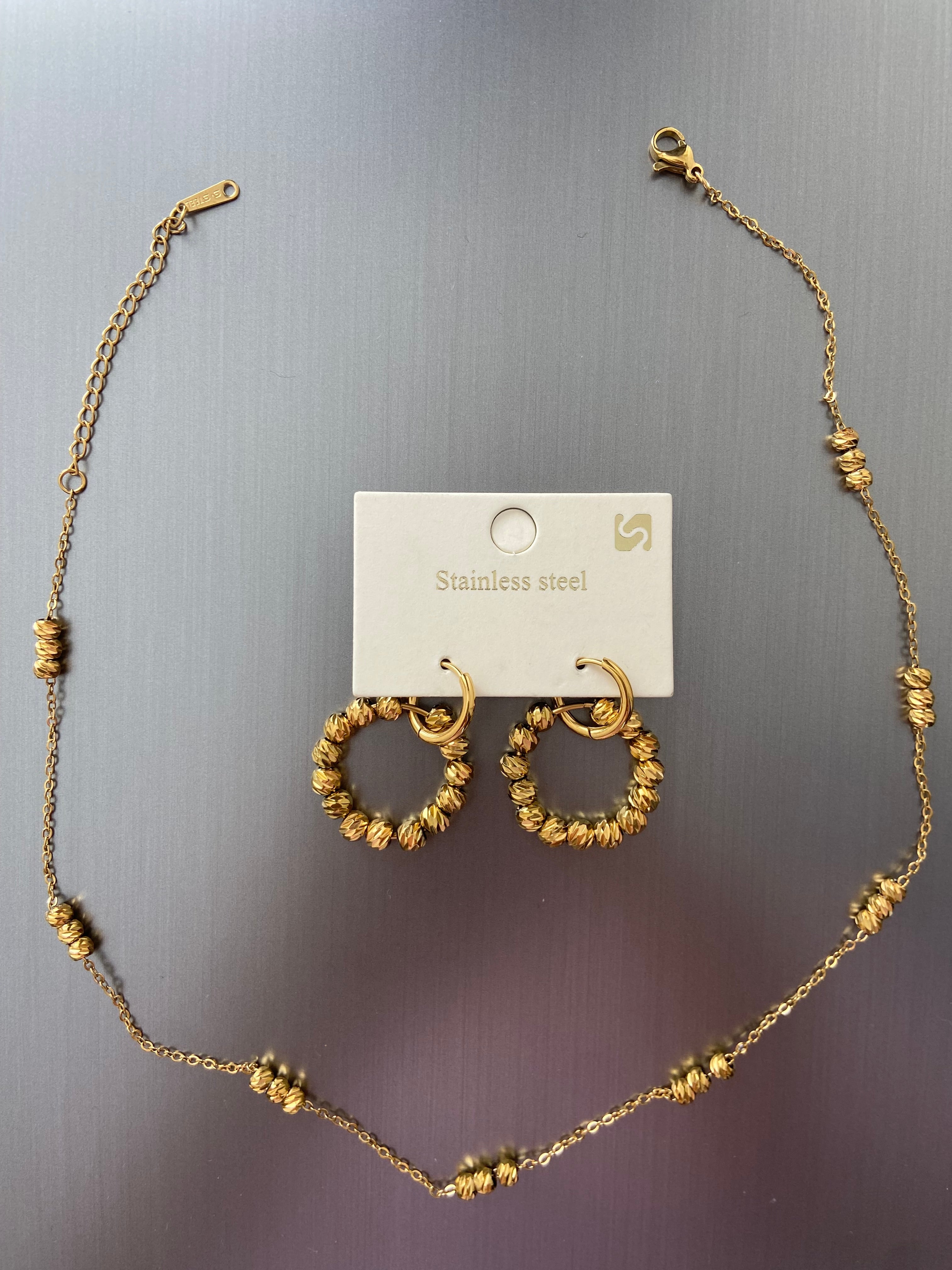 Çelik kolye küpe seti