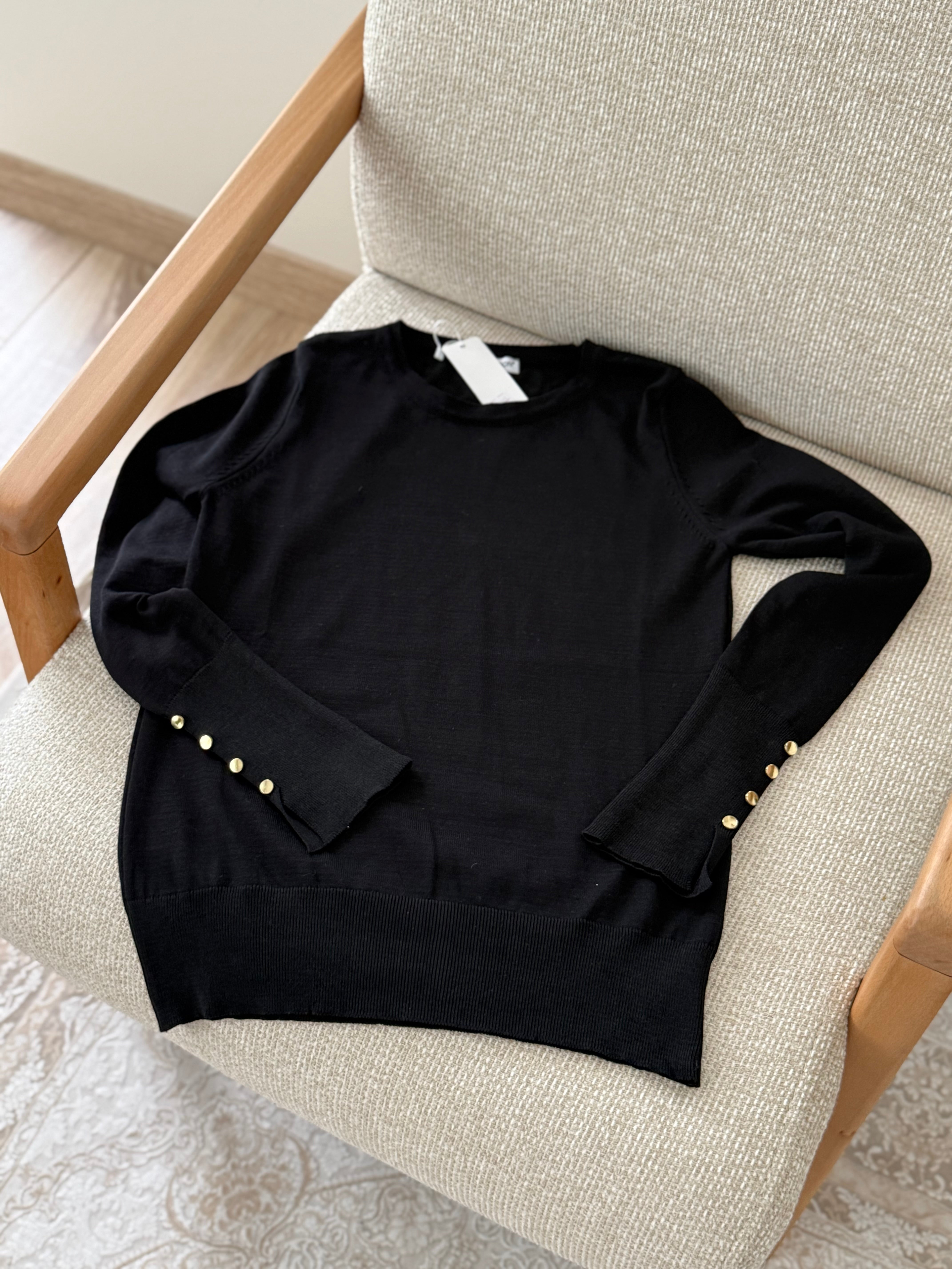 Kolları düğmeli badi