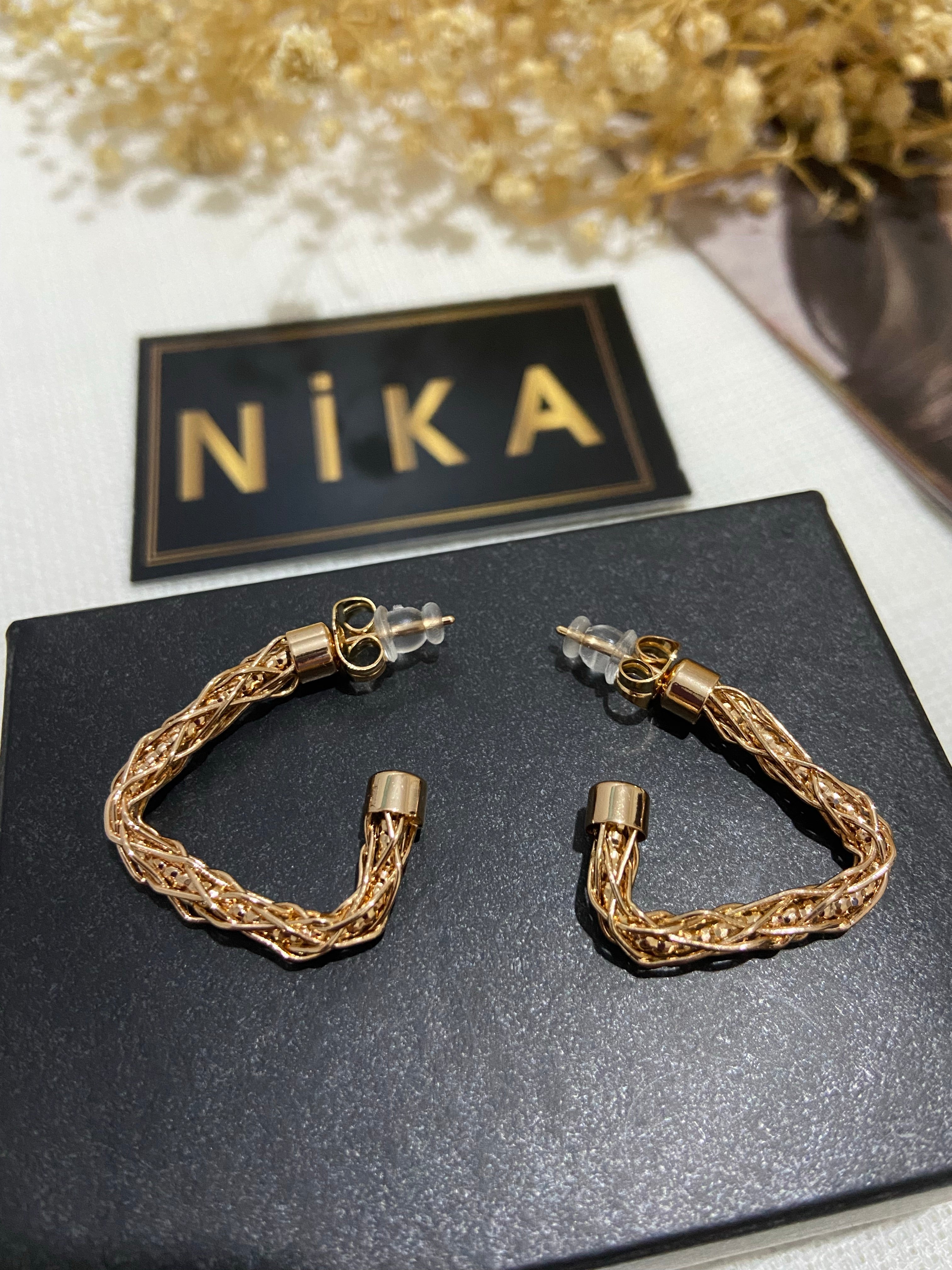 Burgu detaylı küpe