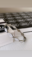 Dörtgen şekilli kelepçe