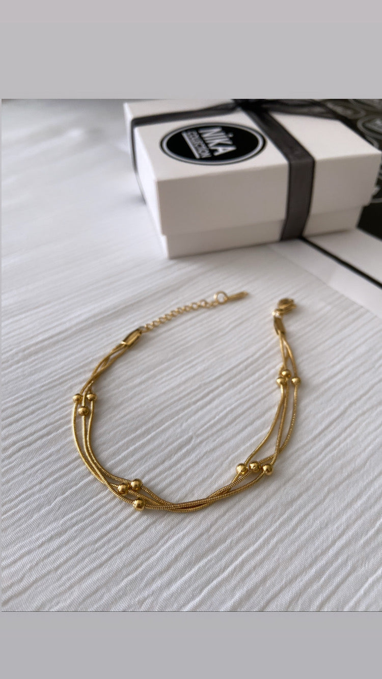 Gold renk üçlü topcuklu bileklik